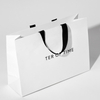 China wholesale luxury Shopping Paper Bags clear white clothes paper bag