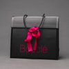 China Custom Hot Stamping Printed Logo Luxury Gift Paper Bags with Ribbon Handles for Retail Store