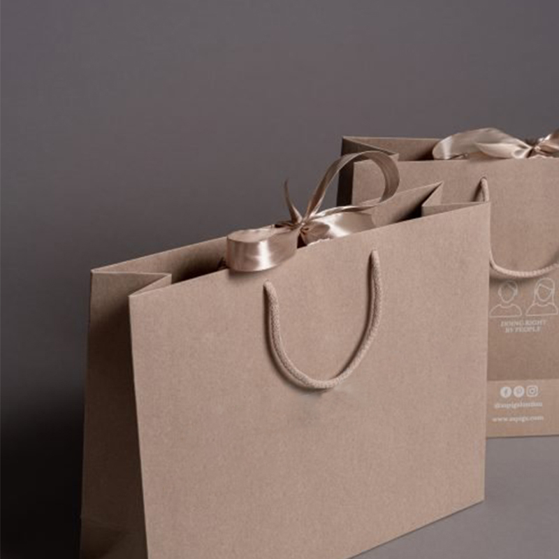 China wholesale cheap luxury kraft favor paper bags brown paper bags with your own logo